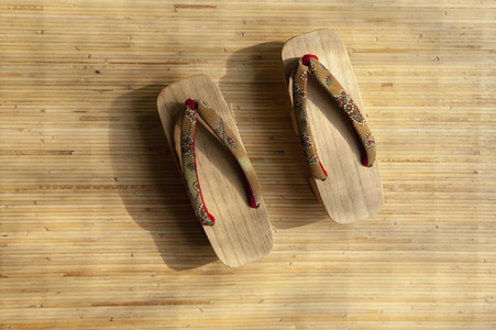 Wooden geta flipflops on tatami mat