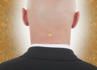 Close up businessman with computer chip in back of head