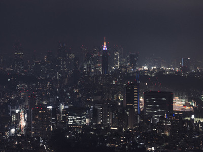 Illuminated cityscape buildings at night Tokyo Japan