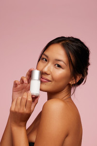 Woman with an effective beauty care product