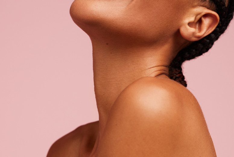 Smiling female model with healthy skin