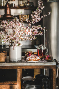 Rose and almond gluten free bundt cake with flowers and tea