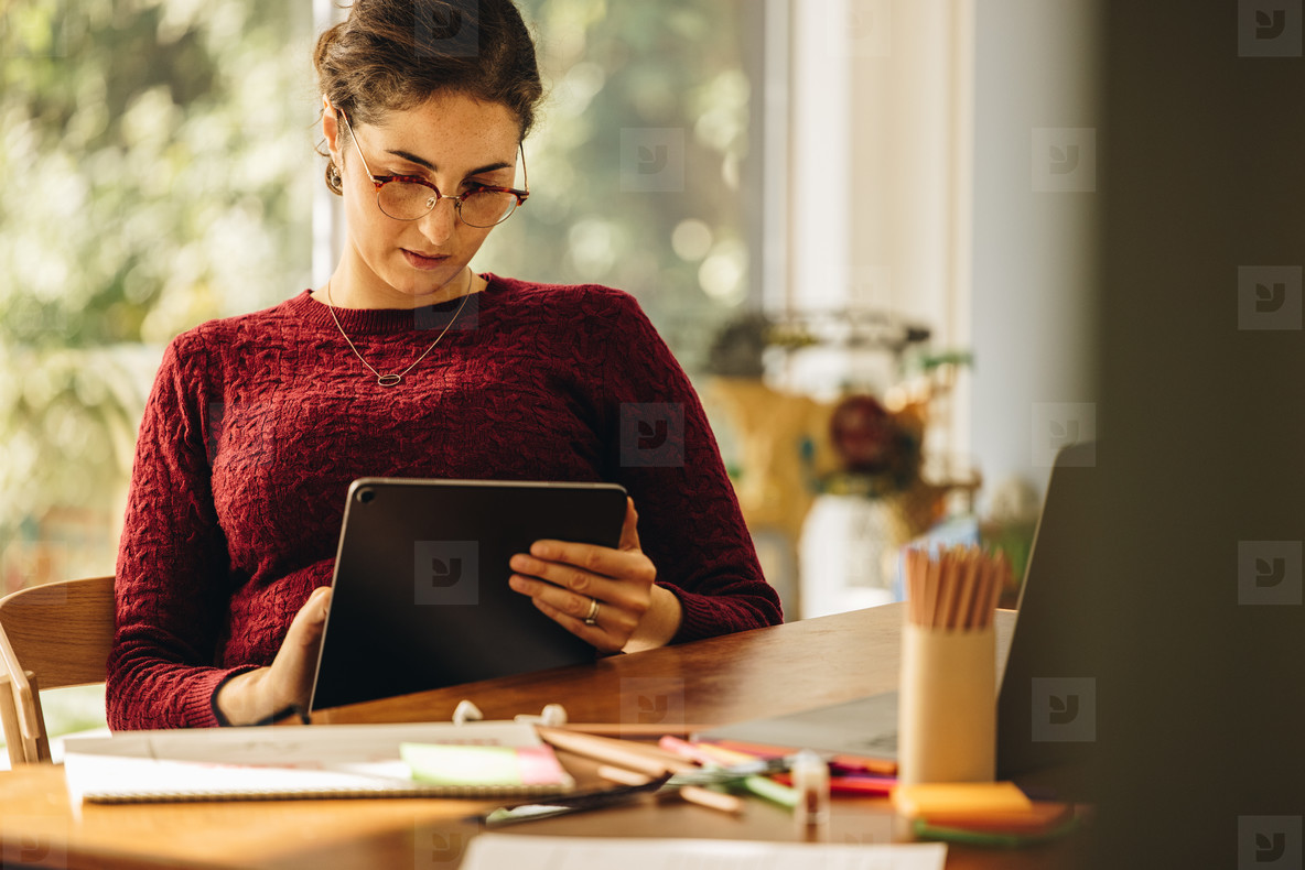 Female designer using tablet