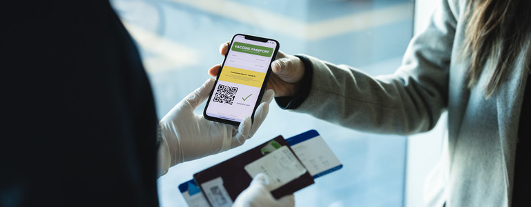 Tourist check in using immunity passport app in mobile phone for