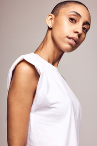 Androgynous female in white t shirt