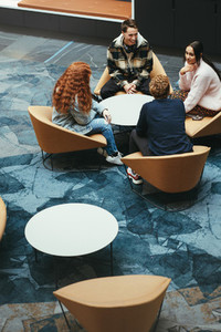 Students at college campus lobby