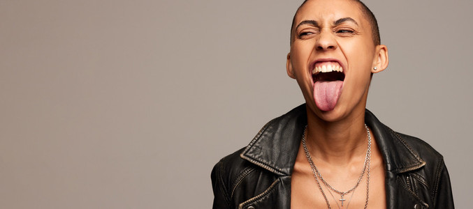 Expressive woman with shaved head