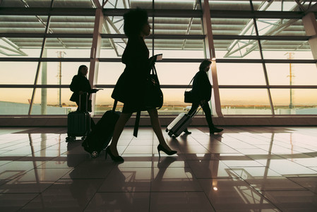 Silhouette of people in airport
