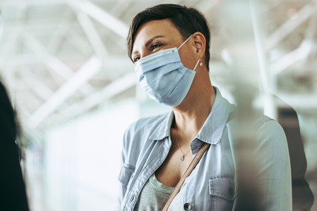 Woman tourist during pandemic at airport