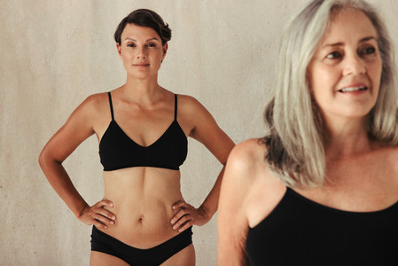 Women of different ages embracing their natural and aging bodies