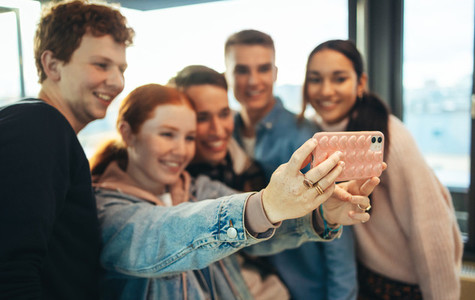 Group of high school students taking selfie