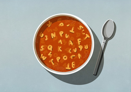 View from above alphabet soup in bowl