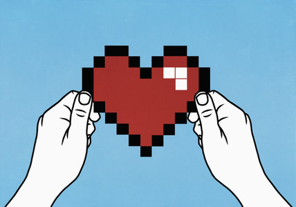 Hands holding pixelated heart