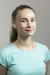 Studio portrait confident young woman