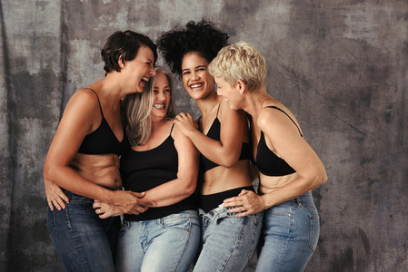 Beautiful women of different ages laughing together
