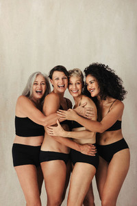 Smiling group of natural and diverse women
