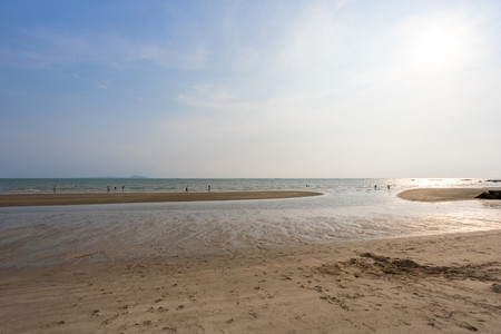 Bangsaen beach in the evening time  Very few people because of t