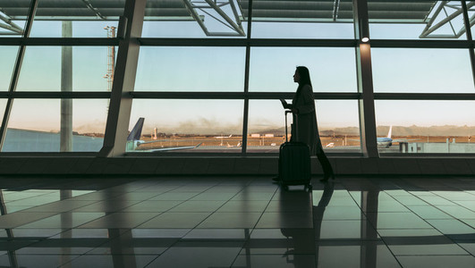 Silhouette of woman traveler