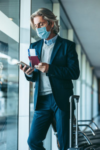 Man with face mask in airport
