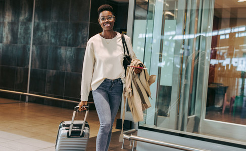 African female traveler at airport