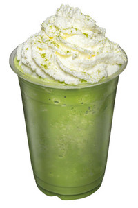 Green Tea Smoothies mixed with whip cream topping on top isolate