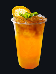Iced Tea mixed with orange juice with orange slices and mint lea