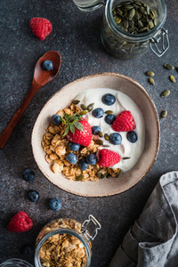 Healthy breakfast  cereal with berries and yogurt
