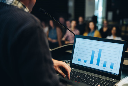 Business laptop at podium in seminar