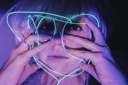 Weird dystopian theme portrait with blue neon lights