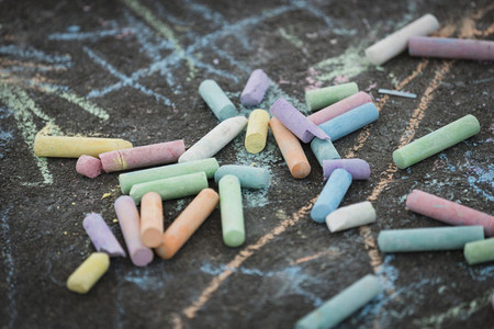 Close up multicolor sidewalk chalk pieces