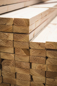 Close up stacked lumber boards