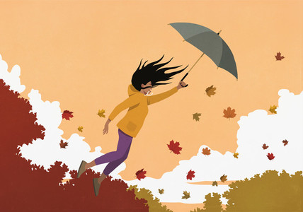 Woman with umbrella flying in autumn wind