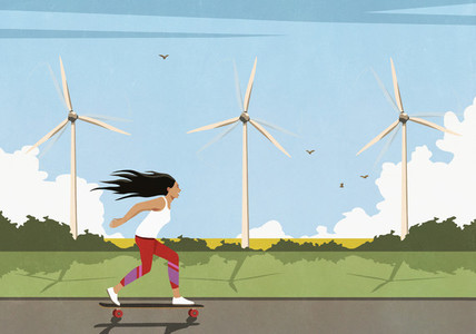 Carefree woman skateboarding along wind turbines in sunny field