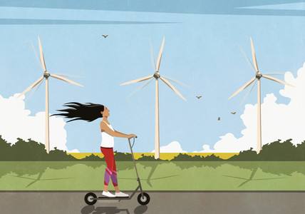 Carefree woman riding electric push scooter along wind turbines