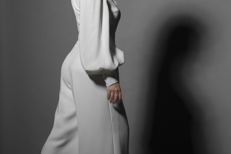 Portrait stylish woman in white