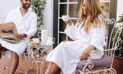 Lovely couple relaxing in morning robes
