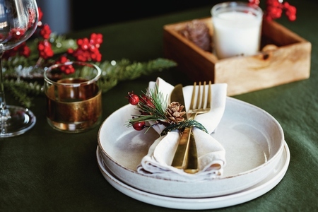 Festive table setting with winter decor  The concept of Thanksgiving or Christmas family dinner