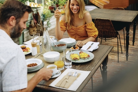Couple enjoying a tasty breakfast at a hotel