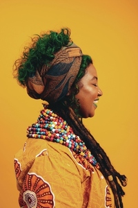 Young woman dressed in African clothing