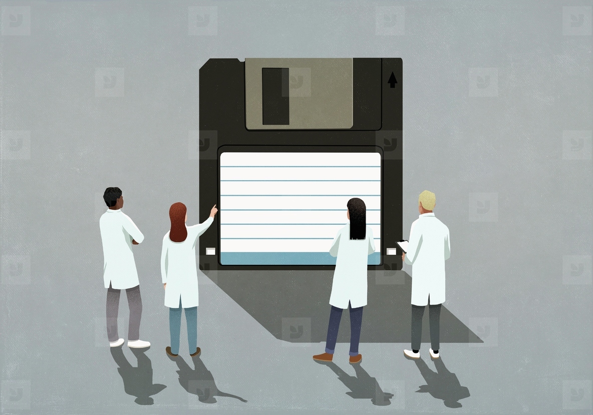 Scientists in lab coats looking at floppy disk