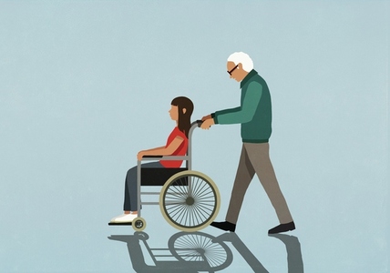 Senior man pushing girl in wheelchair