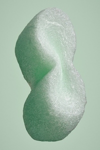 Close up green Styrofoam packaging peanut