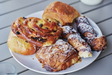 Close up variety of French pastries on plate