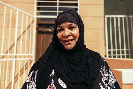 Cheerful Muslim woman looking at the camera with a smile