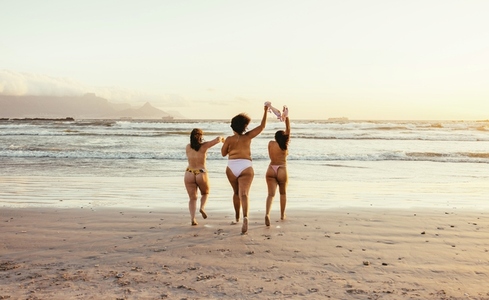 Women enjoying summer in their natural bodies