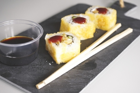 Fushion food of cooked and hot chicken sushi