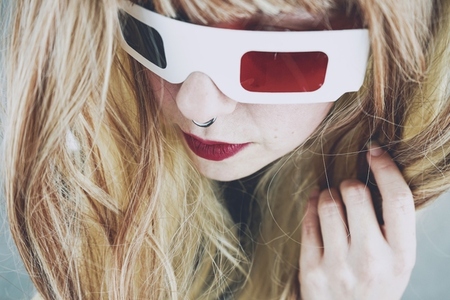 Young woman wearing vintage 3D glasses