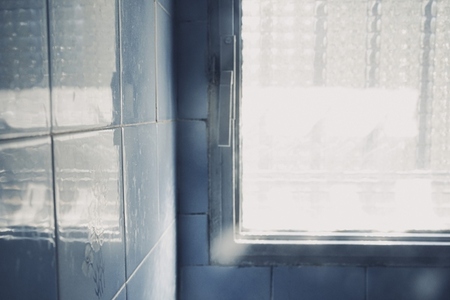 Old window in a bathroom detail