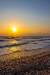 Beautiful sea waves in the morning sunrise