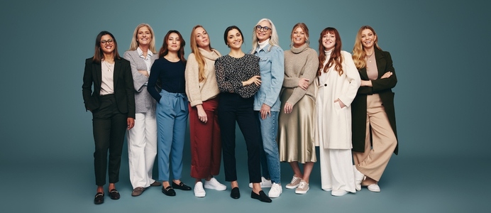 Multiethnic group of women standing in a studio